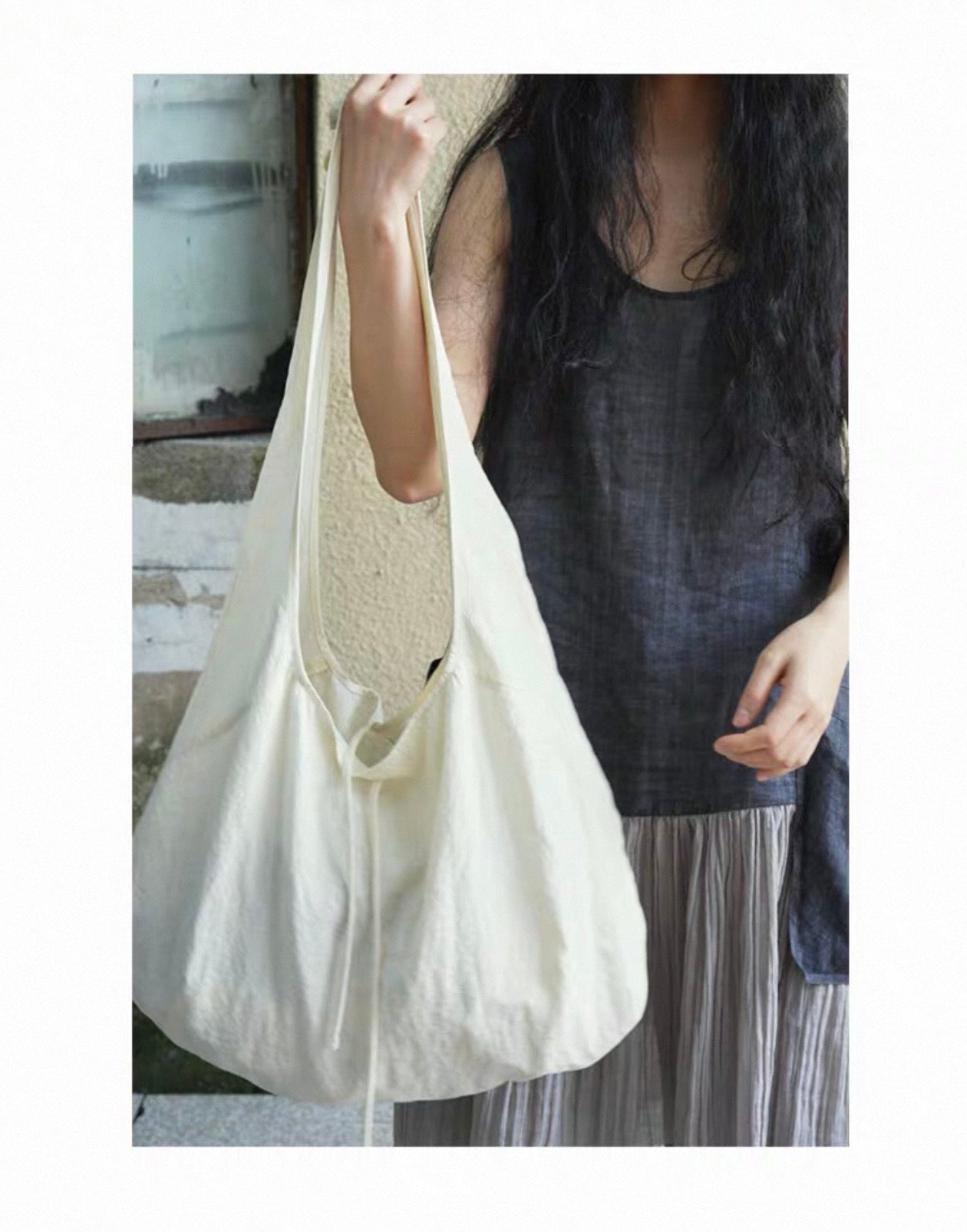 <Another i.> Adjustable Egg-Shaped Crossbody Bag